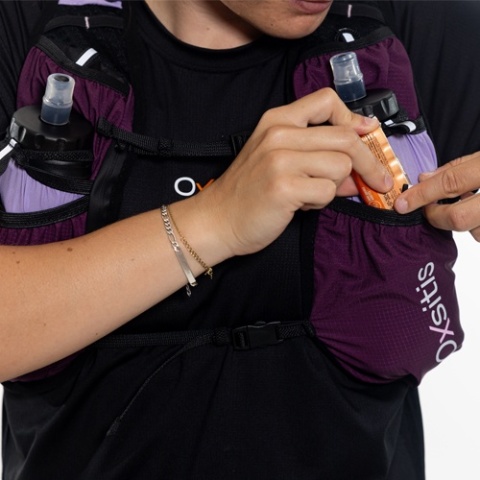 Kamizelka biegowa damska Oxsitis Gravity 10 - lilac - kieszeń nad bidonem