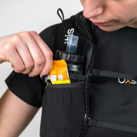 Plecak biegowy Oxsitis Spectre 12 - black/orange - kieszeń na przekąski